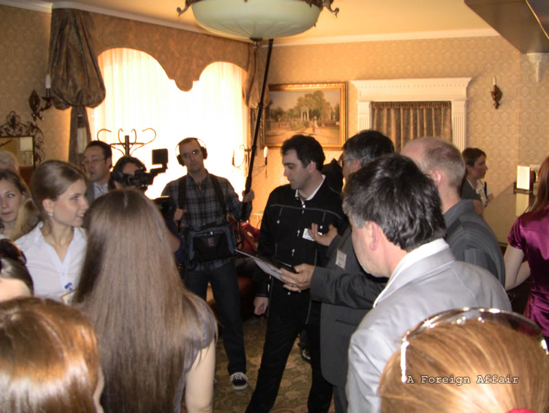 Reality TV client meeting translators after arrival